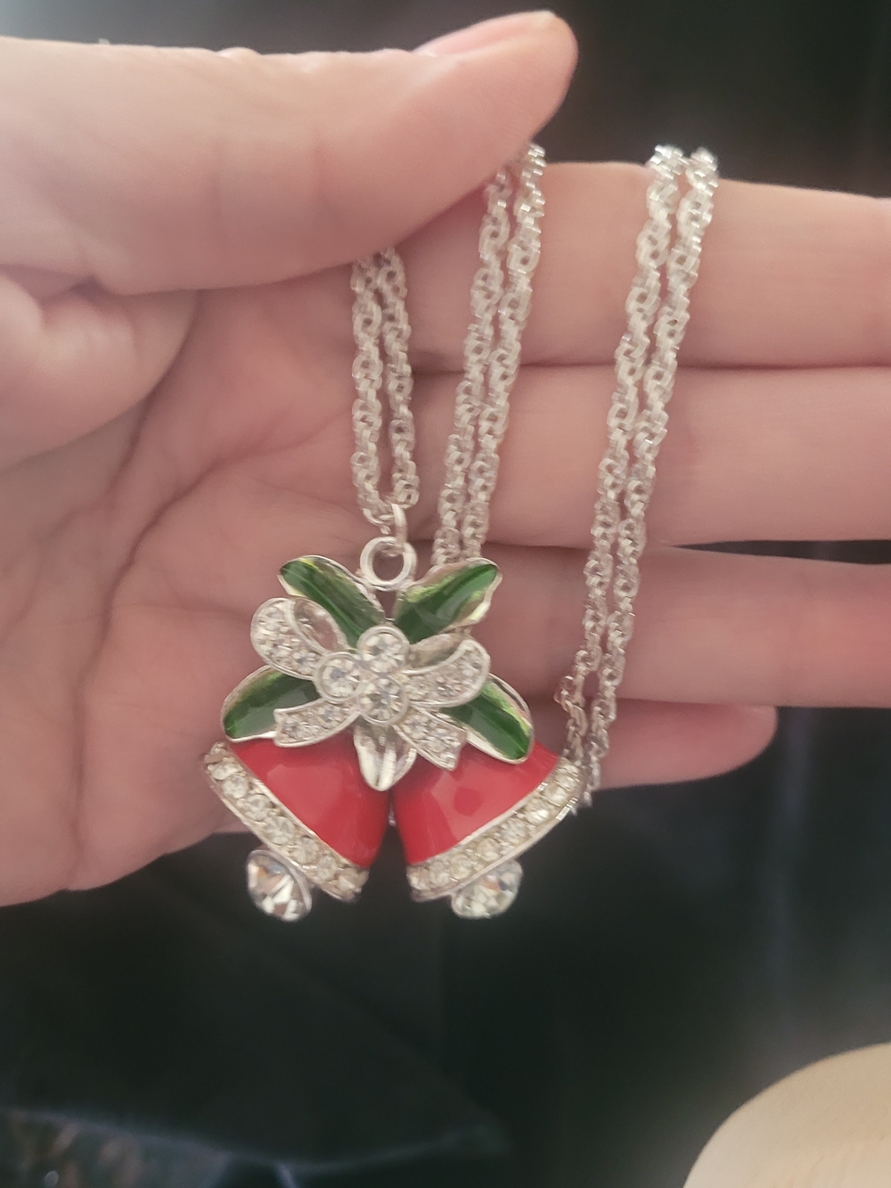 Festive Red Bell Pendant Necklace with Green Accents